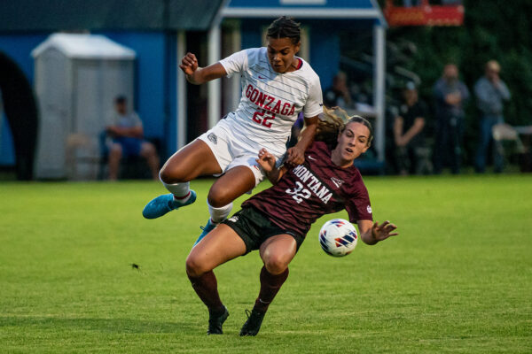 Bulldog Alexis Parker and Grizzly Emma Windsor vie for control of the ball in the Gonzaga-Montana exhibition game in Columbia Falls Sunday, August 11. (Avery Howe/Bigfork Eagle)